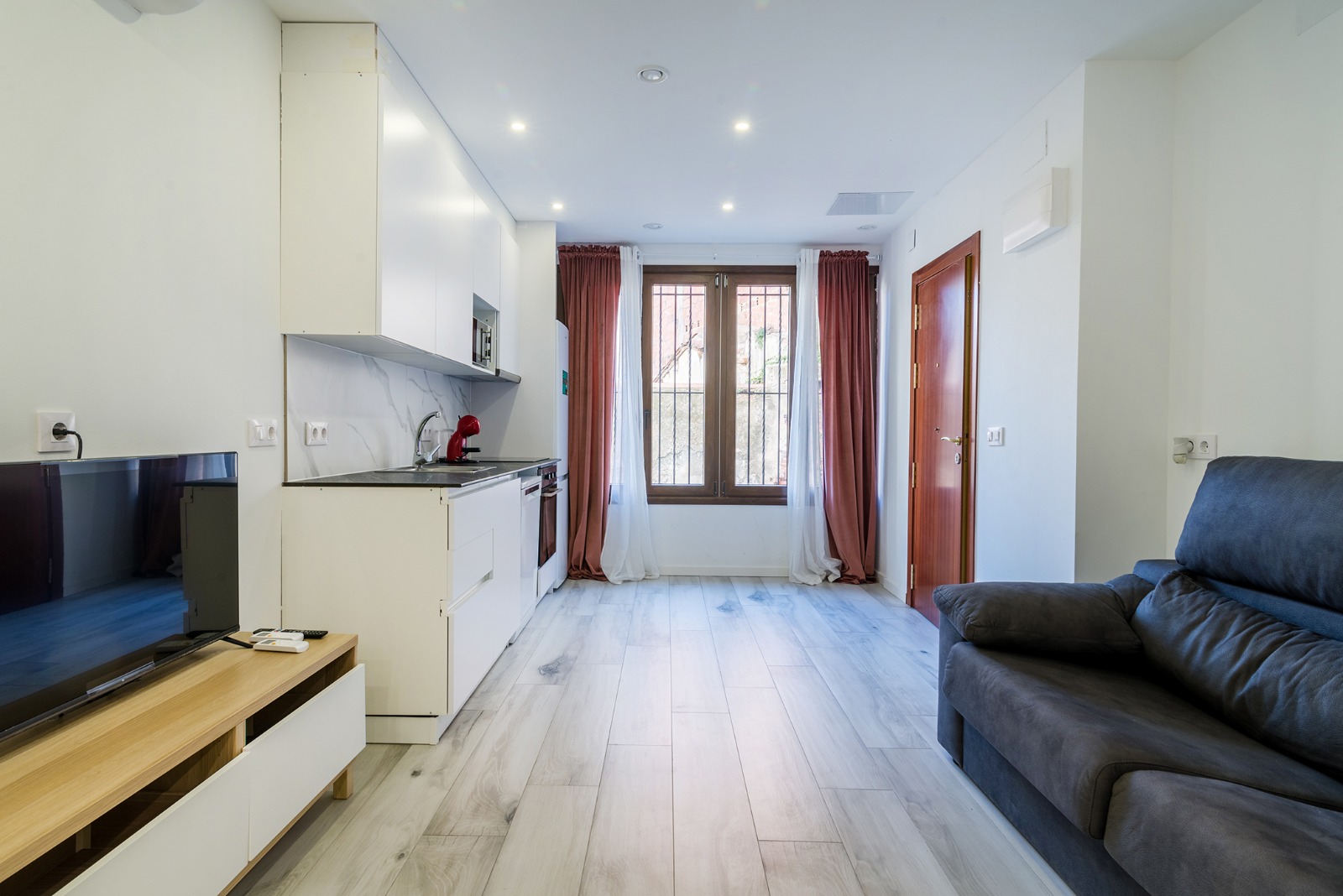 Salón con cocina integrada